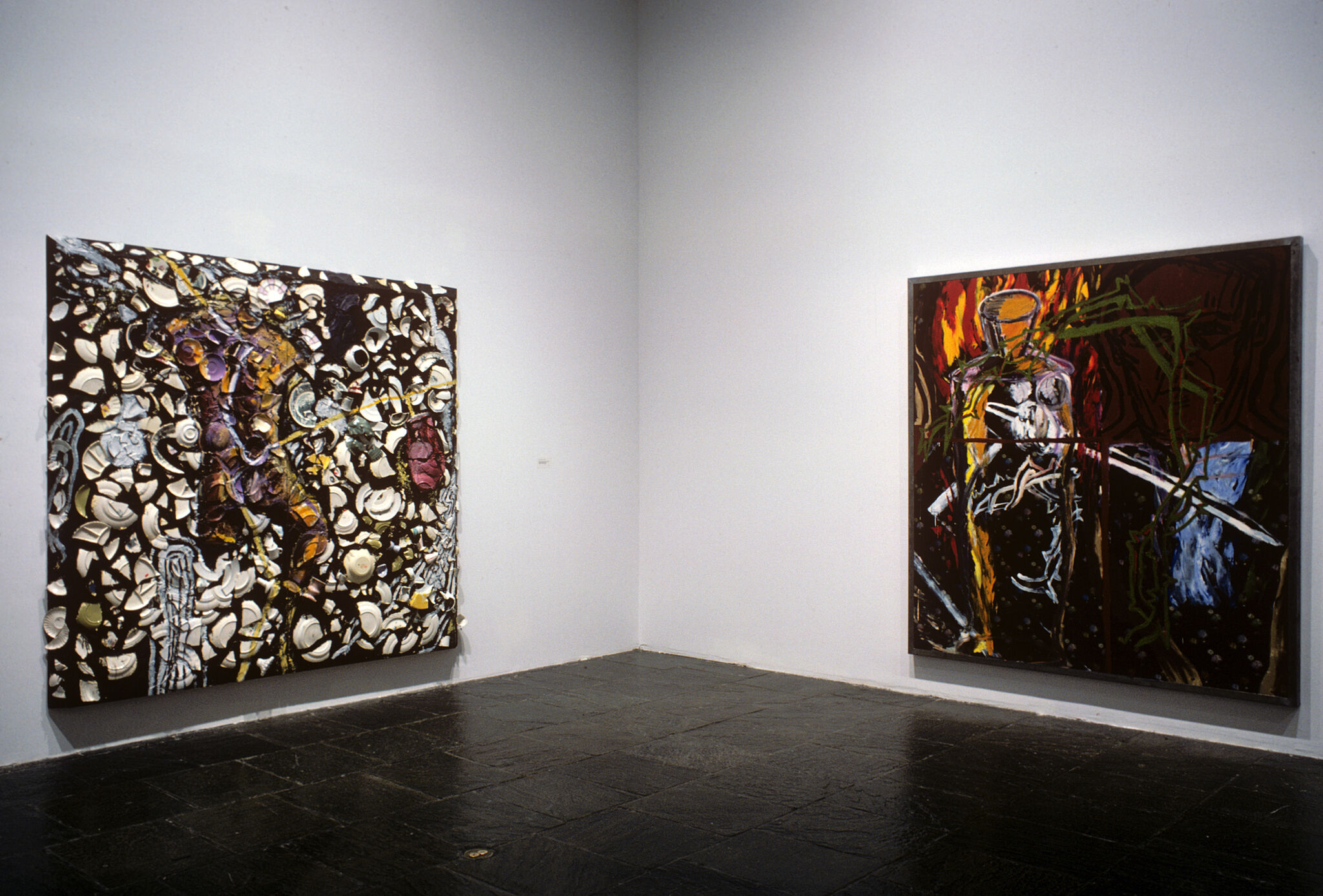 Two works of art in a gallery.