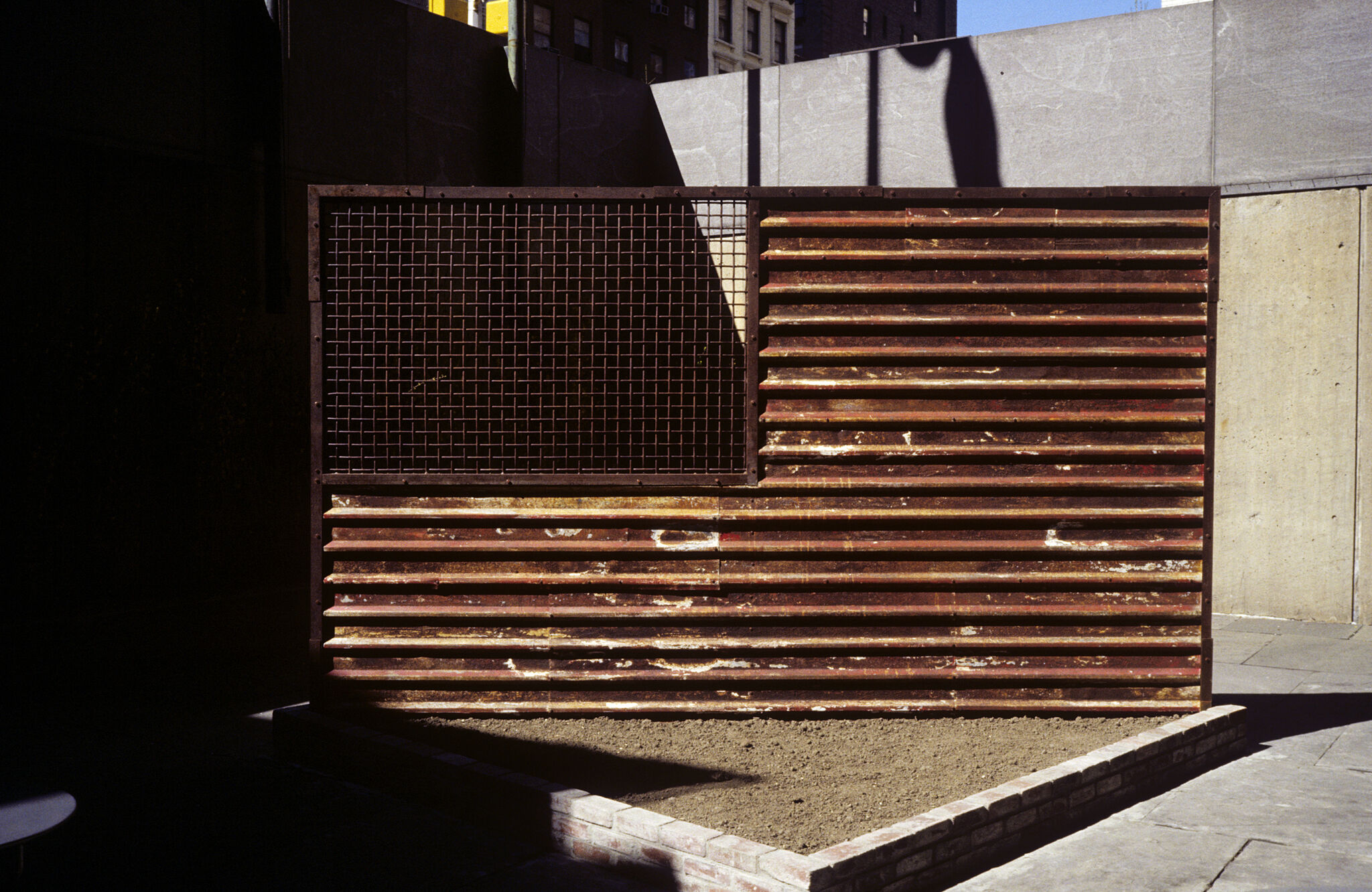 American flag made out of rusted metal.