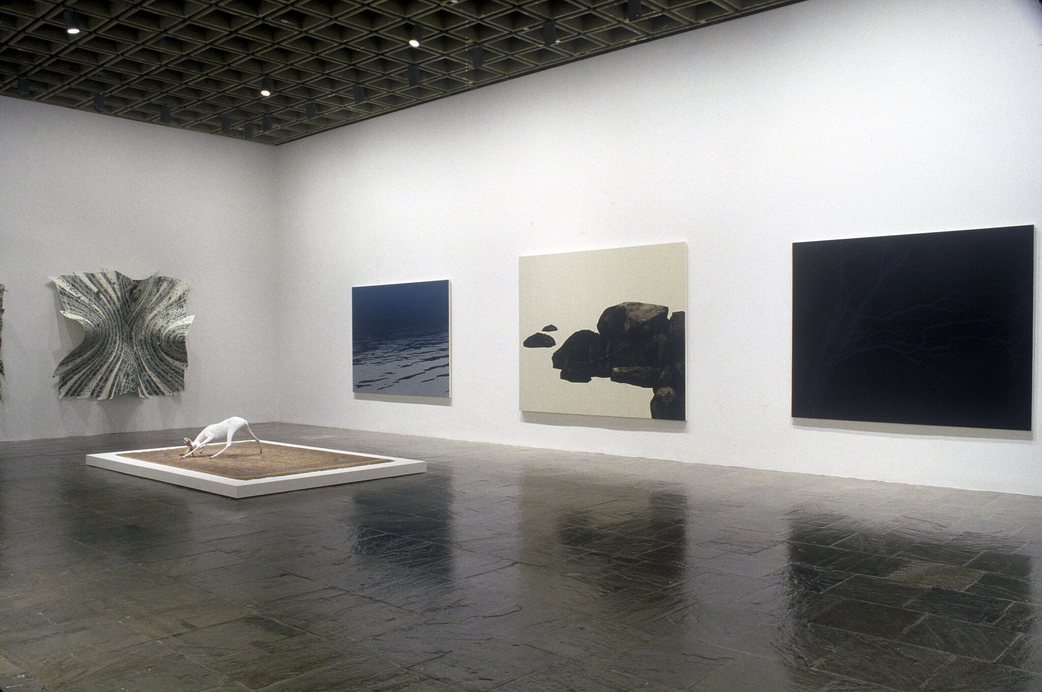 A gallery filled with various works of art.