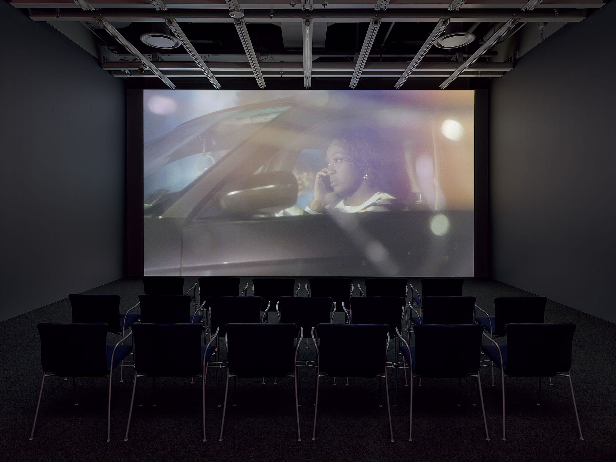An installation view of a video projection in a gallery.