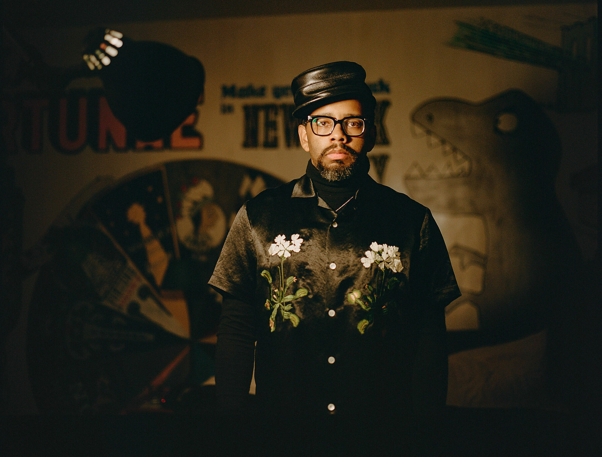 A photograph of drummer Jamire Williams