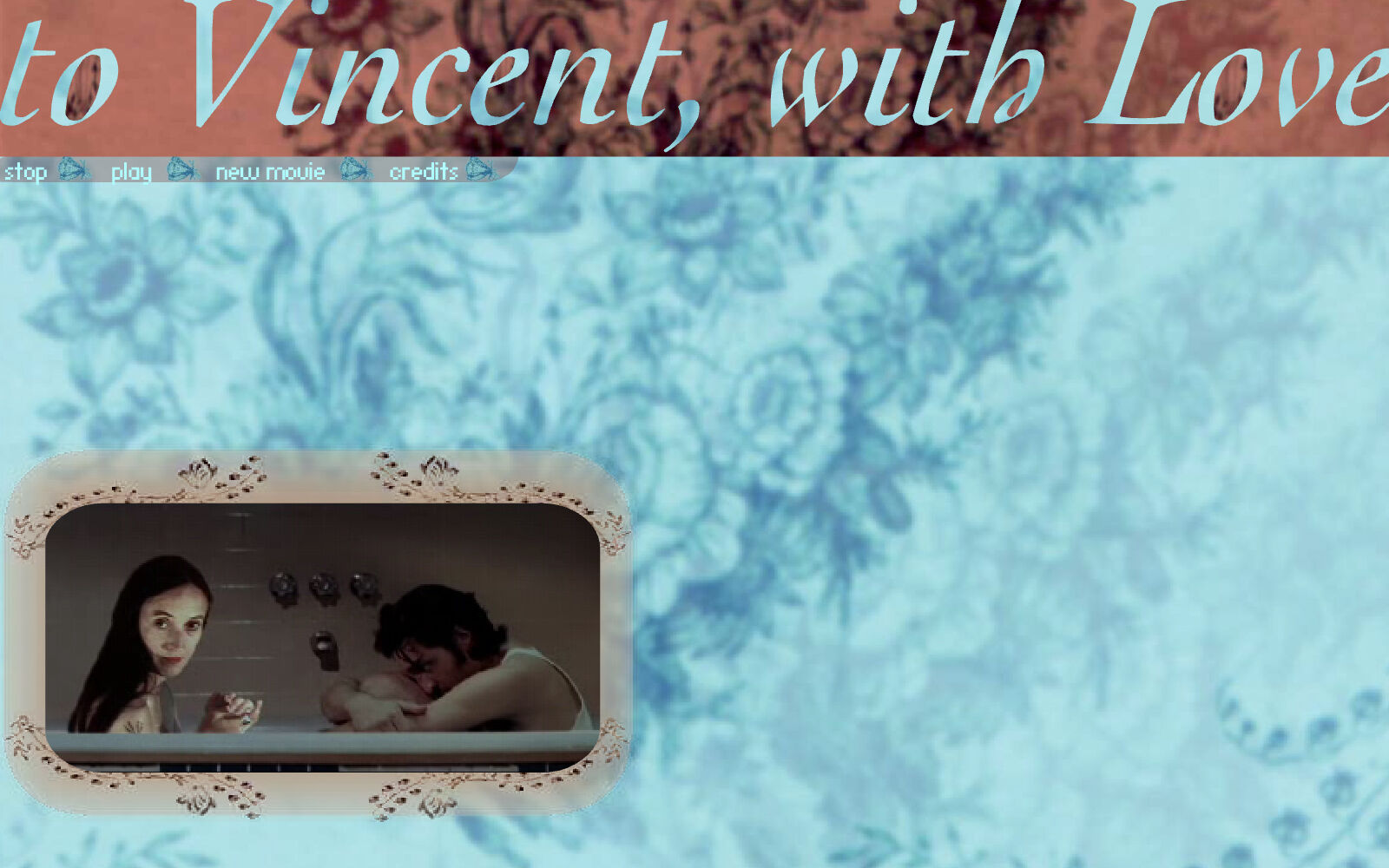 Screenshot of a webpage with a light blue flower pattern background. On the bottom left is a rounded still of a video of a man and a woman in a bathtub with the woman looking towards the camera. At the top is the text "to Vincent, with love."