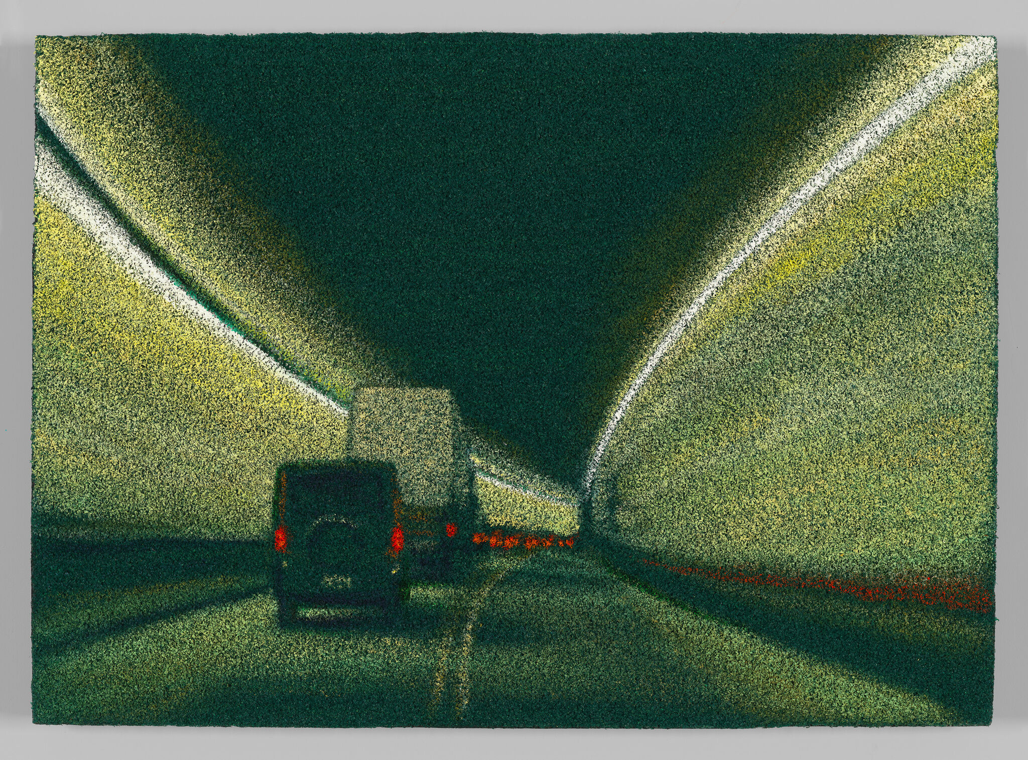 A van and a truck drive through a dimly lit tunnel with blurred lights creating a sense of motion.